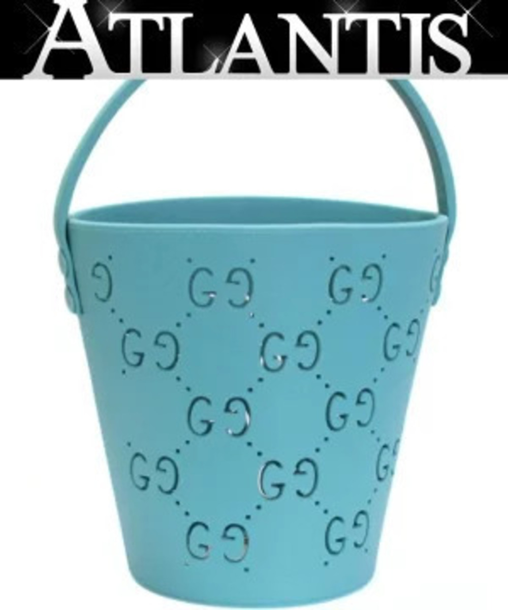 Gucci blue GG Rubber Bucket Bag perforated monogram
